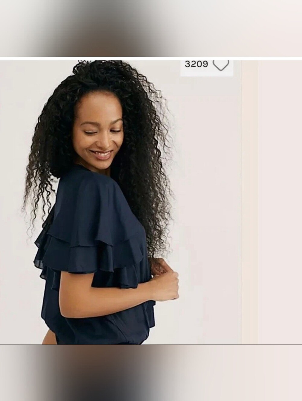 Free People top "Island Angel Flutter Top" features a distinctly bohemian Look - Picture 9 of 10